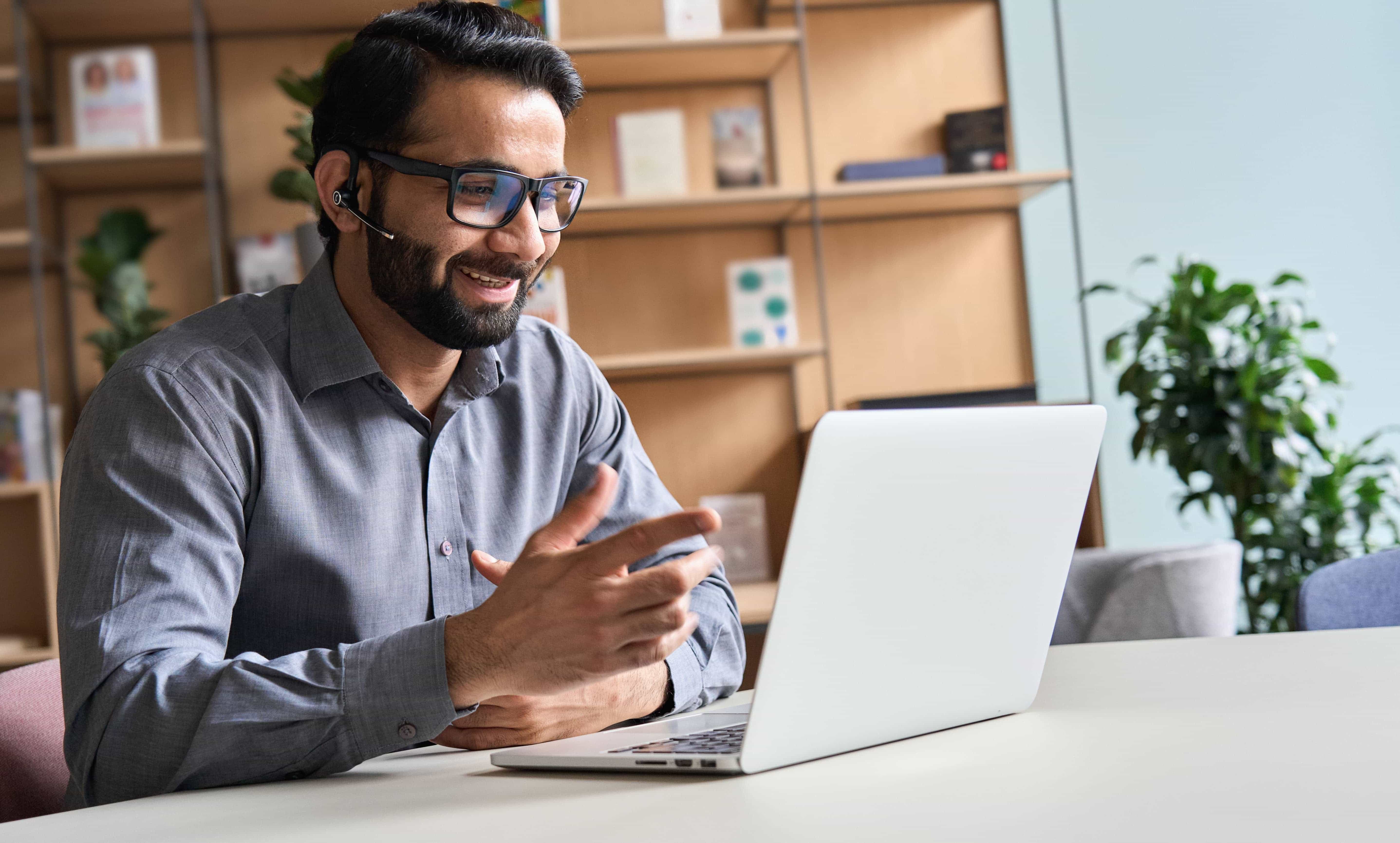 Man talking through a laptop