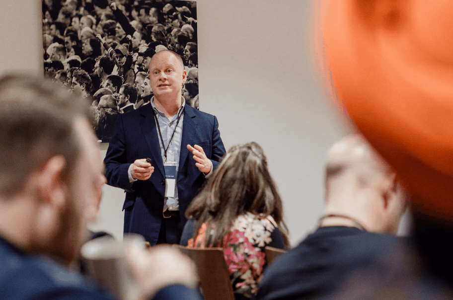 A man talking at an event